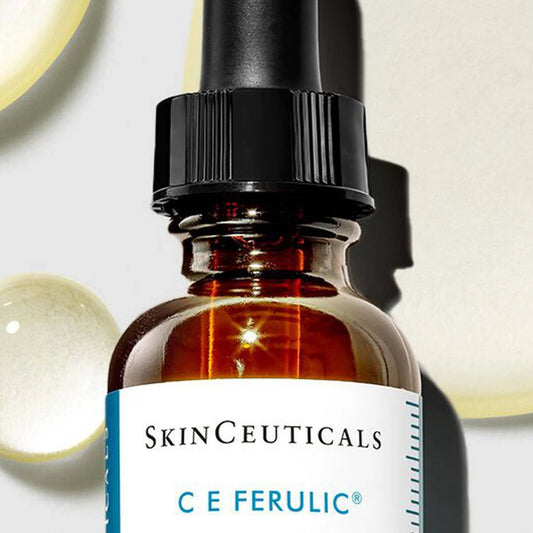 SkinCeuticals C E Ferulic skincare serum bottle with dropper on a neutral background